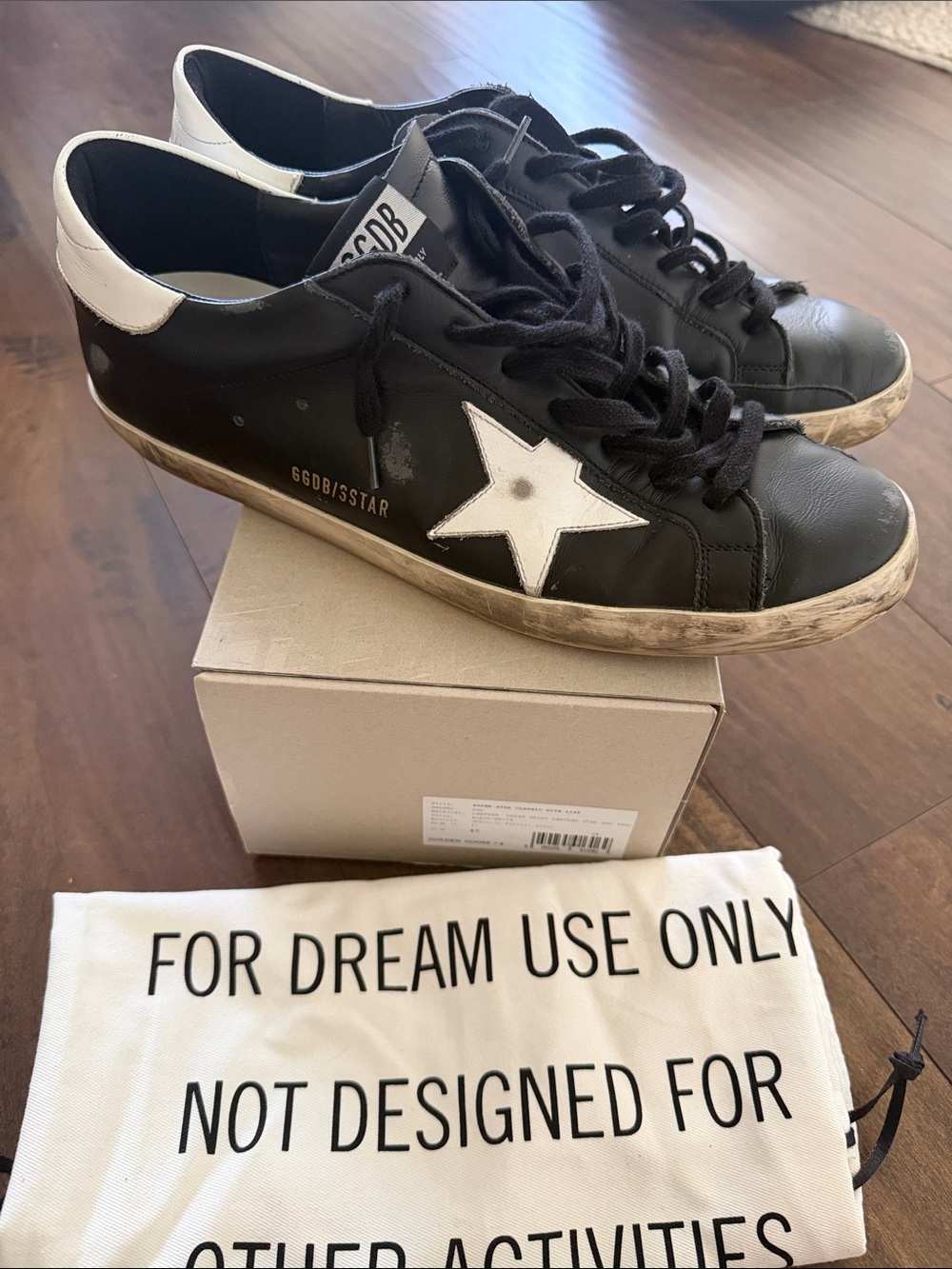 Golden Goose Superstars Men’s Black Leather Sneakers with White Star